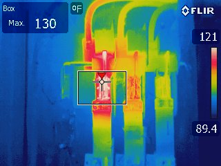 Thermal image of a three-phase connection where one phase is hotter than the other two, 130 °F maximum